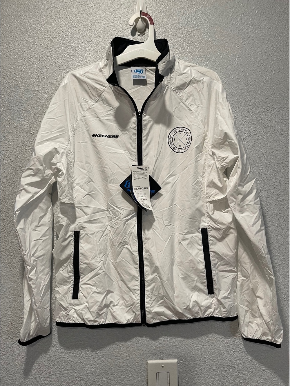 Skechers Lightweight White Windbreaker Jacket with Black Acc